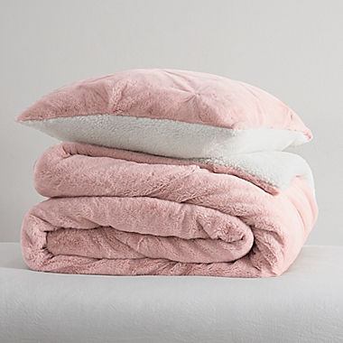 UGG&reg; Polar Pintuck 2-Piece Reversible Twin Comforter Set in Peach. View a larger version of this product image.