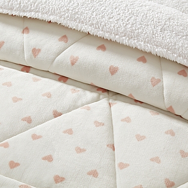 UGG&reg; Avery Heart 3-Piece Reversible Full/Queen Comforter Set in White/Pink. View a larger version of this product image.