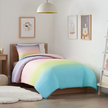 UGG&reg; Devon Ombre 3-Piece Reversible Full/Queen Comforter Set in Rainbow. View a larger version of this product image.