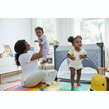 Century&reg; Play On&trade; 2-in-1 Playard and Activity Center in Berry. View a larger version of this product image.