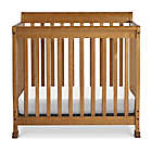 Alternate image 1 for DaVinci Kalani 4-in-1 Convertible Mini Crib in Chestnut