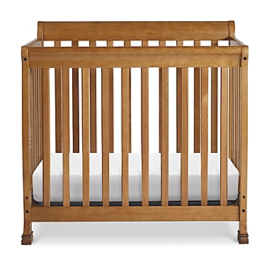 DaVinci Kalani 4-in-1 Convertible Mini Crib in Chestnut. View a larger version of this product image.