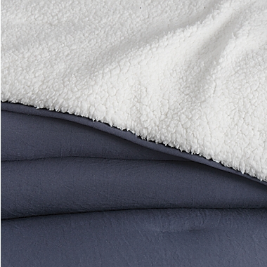UGG&reg; Devon Sherpa 3-Piece Reversible Full/Queen Comforter Set in Navy. View a larger version of this product image.