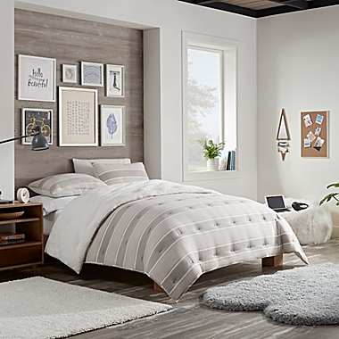 UGG&reg; Devon Sherpa 2-Piece Twin/Twin XL Reversible Comforter Set in Oatmeal Stripe. View a larger version of this product image.