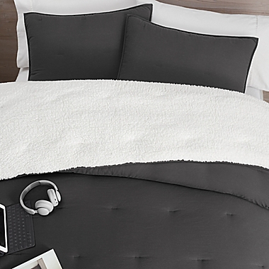 UGG&reg; Devon Sherpa 3-Piece Reversible Full/Queen Comforter Set in Black. View a larger version of this product image.