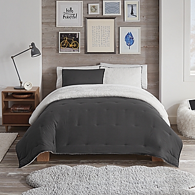 UGG&reg; Devon Sherpa 3-Piece Full/Queen Reversible Comforter Set in Black. View a larger version of this product image.