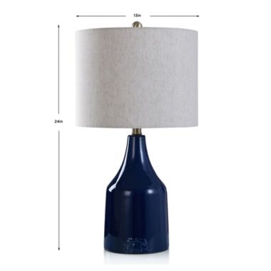 Bee &amp; Willow&trade; 24-Inch Logo Ceramic Table Lamp in Navy. View a larger version of this product image.