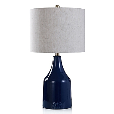 Bee &amp; Willow&trade; 24-Inch Logo Ceramic Table Lamp in Navy. View a larger version of this product image.