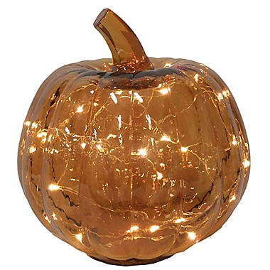 Bee &amp; Willow&trade; Glass LED-Lit Pumpkin Decoration in Amber. View a larger version of this product image.