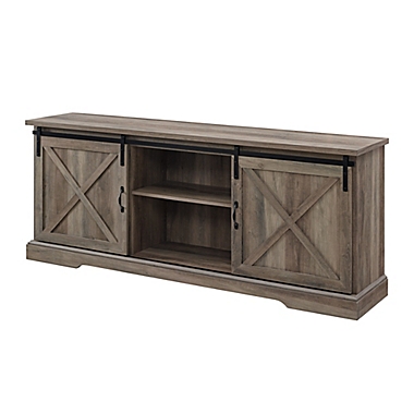 Forest Gate Wheatland 70-Inch Farmhouse Sliding Barn Door TV Stand in Grey Wash. View a larger version of this product image.