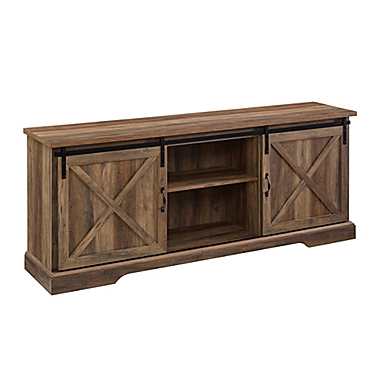 Forest Gate Wheatland 70-Inch Farmhouse Sliding Barn Door TV Stand in Rustic Oak. View a larger version of this product image.