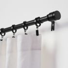 Alternate image 1 for Simply Essential&trade; Deco 72 to 144-Inch Adjustable Single Curtain Rod Set in Black