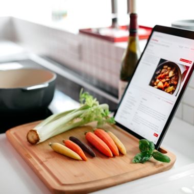 Simply Essential&trade; Bamboo Cutting Board with Phone/Tablet Slot. View a larger version of this product image.