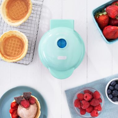 Dash&reg; Mini Waffle Bowl Maker in Aqua. View a larger version of this product image.