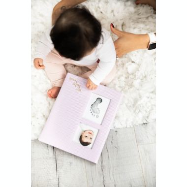 Pearhead&reg; Seersucker Baby Memory Book in Pink. View a larger version of this product image.