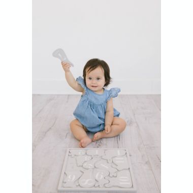 Pearhead&reg; 12-Piece Monthly Milestone Bunny Puzzle in Grey. View a larger version of this product image.