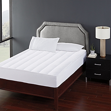 Brookstone&reg; Twin Heated Mattress Pad in White. View a larger version of this product image.