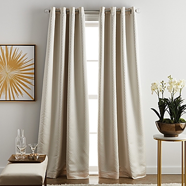 Martha Stewart Lynx 84-Inch Grommet 100% Blackout Window Curtain Panels in Ivory (Set of 2). View a larger version of this product image.