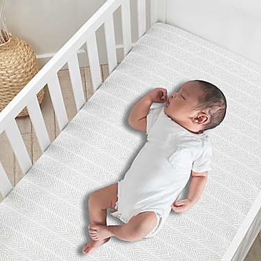 Lambs &amp; Ivy&reg; Linen Safari 4-Piece Crib Bedding Set in White. View a larger version of this product image.