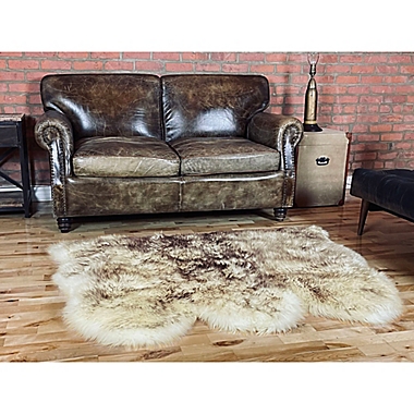 Natural New Zealand Triple Sheepskin 3&#39; x 5&#39; Handcrafted Area Rug in Chocolate. View a larger version of this product image.
