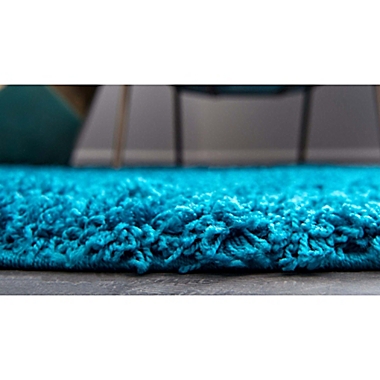 Unique Loom 2&#39;6 x 10&#39; Solid Shag Runner in Turquoise. View a larger version of this product image.