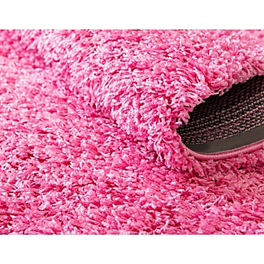 Unique Loom Solid Shag 7&#39; x 10&#39; Area Rug in Taffy Pink. View a larger version of this product image.