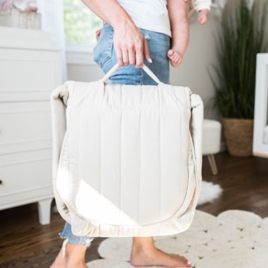 Baby Delight&reg; Snuggle Nest&trade; Organic Portable Infant Lounger in Oatmeal. View a larger version of this product image.