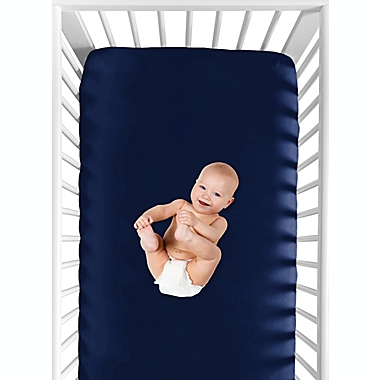 Sweet Jojo Designs Mod Dinosaur Fitted Crib Sheet in Navy. View a larger version of this product image.