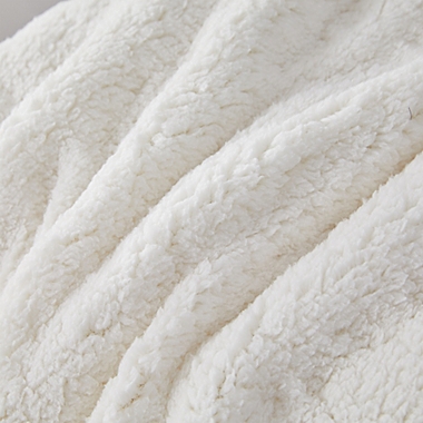 Sherpa Twin Reversible Comforter in Coconut Milk. View a larger version of this product image.