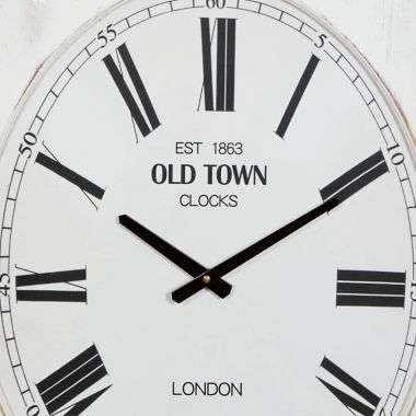 Ridge Road Décor 22-Inch x 31-Inch Farmhouse Wood Wall Clock in White. View a larger version of this product image.