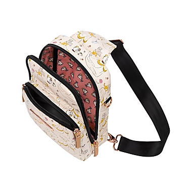 Petunia Pickle Bottom&reg; Criss-Cross Sling Diaper Crossbody Bag in Whimsical Belle. View a larger version of this product image.