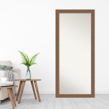 Amanti Art Alta 29-Inch x 65-Inch Framed Full-Length Floor/Leaner Mirror in Medium Brown. View a larger version of this product image.
