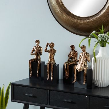 Ridge Road D&eacute;cor 4-Piece Modern Musician Porcelain Sculpture Set in Copper. View a larger version of this product image.