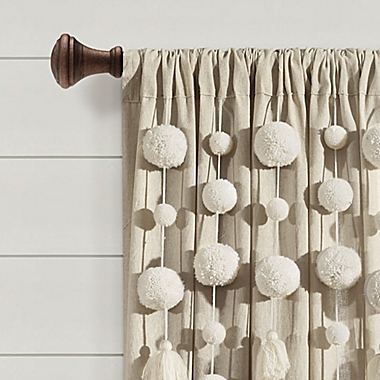 Lush D&eacute;cor Boho Pom-Pom Tassel 84-Inch Rod Pocket Window Curtain Panel in Linen (Single). View a larger version of this product image.