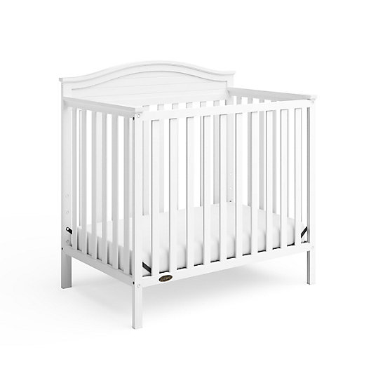 Alternate image 1 for Graco® Stella 4-in-1 Convertible Mini Crib with Mattress in White