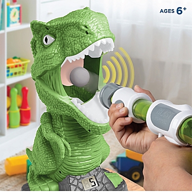 Discovery Kids&trade; T-Rex Feeding Game in Green/White. View a larger version of this product image.