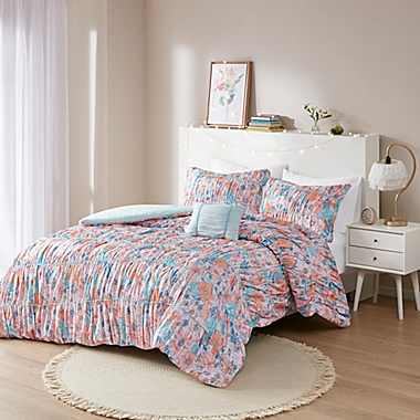 Intelligent Design Mae Floral Printed Ruched 3-Piece Twin/Twin XL Comforter Set in Pink/Blue. View a larger version of this product image.