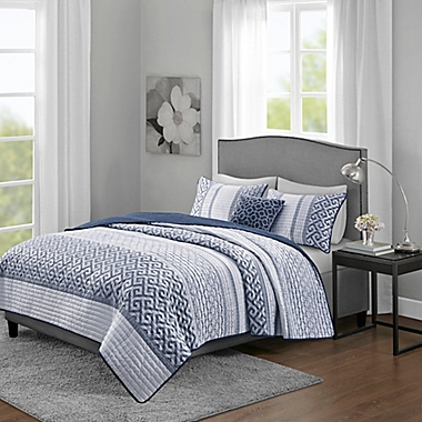 Madison Park Bennett Reversible Jacquard 4-Piece Full/Queen Coverlet Set in Navy. View a larger version of this product image.