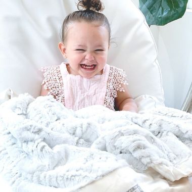 Zalamoon Strollet Plush Blanket with Designated Satin Trim Corner. View a larger version of this product image.