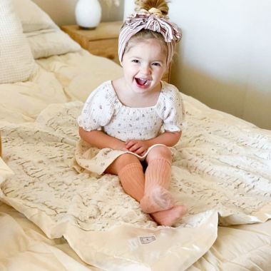 Zalamoon Strollet Plush Blanket with Designated Satin Trim Corner. View a larger version of this product image.