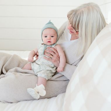 goumi Coastal Organic Cotton Romper in Green/Cream. View a larger version of this product image.