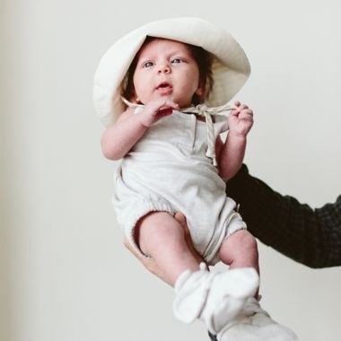 goumi Organic Cotton Romper in Storm Grey. View a larger version of this product image.
