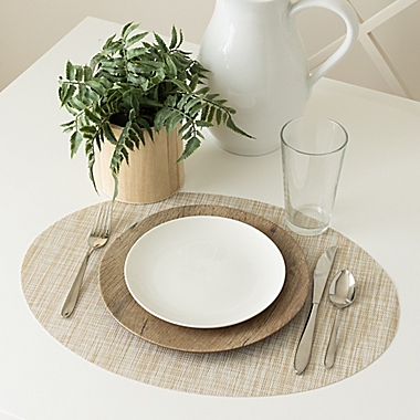 Studio 3B&trade; French Oval Woven Vinyl Placemats in Natural (Set of 4). View a larger version of this product image.