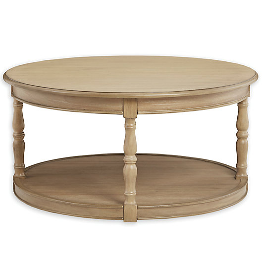 Alternate image 1 for Martha Stewart Belden Castered Round Coffee Table in Natural