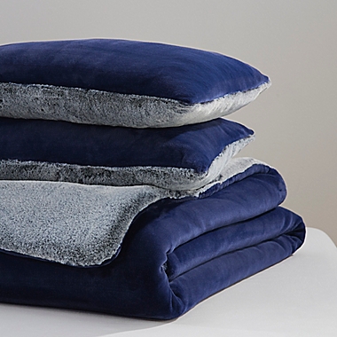 UGG&reg; Coco Dawson 2-Piece Reversible Twin Comforter Set in Navy. View a larger version of this product image.