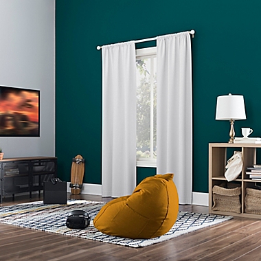Sun Zero Jules Total Blackout 63-Inch Rod Pocket Window Curtain Panel in White. View a larger version of this product image.