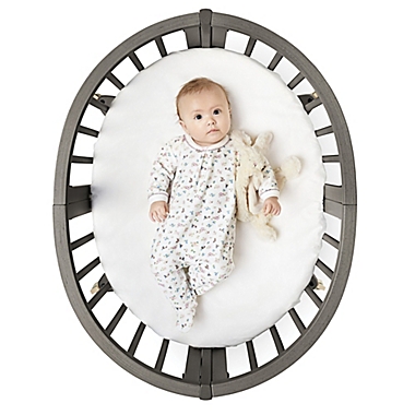 Stokke&reg; Sleepi&trade; Mini with Drape Rod and Mattress in Hazy Grey. View a larger version of this product image.