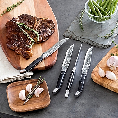 Laguiole&reg; French Home Connoisseur 4-Piece Wood BBQ Steak Knife Set in Black. View a larger version of this product image.