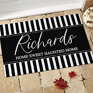 Spellbinding Stripes Personalized Black & White Halloween Doormat. View a larger version of this product image.