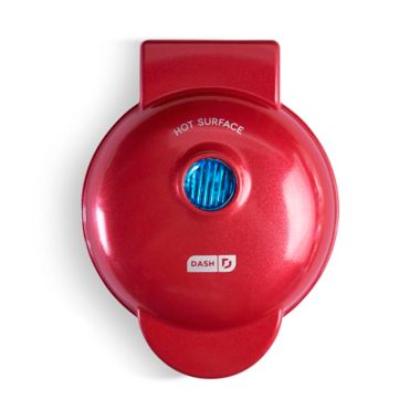 Dash&reg; Gingerbread Man Mini Waffle Maker in Red. View a larger version of this product image.